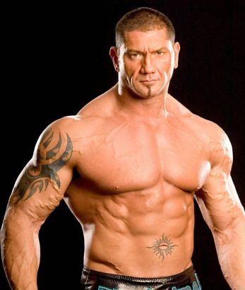 Dave Batista Arm And Navel Tattoo